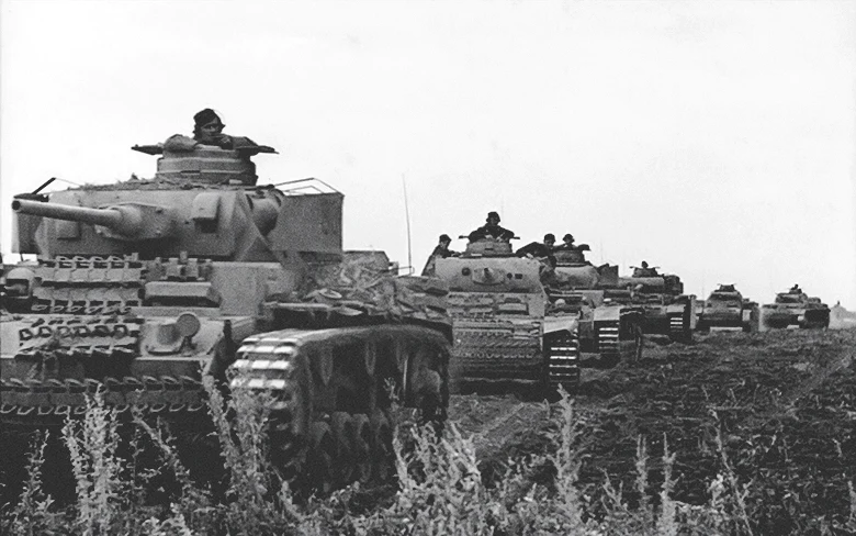 A column of Panzer III in an open field during Operation Citadel, June 1943