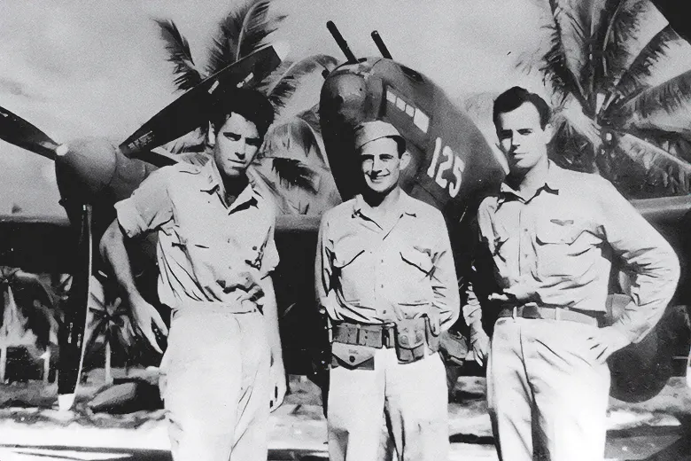 Capt. Tom Lanphier, Jr., Lt. Besby Holmes, and Lt. Rex Barber pose before one of the Lightnings from the 339th FS the day after the mission