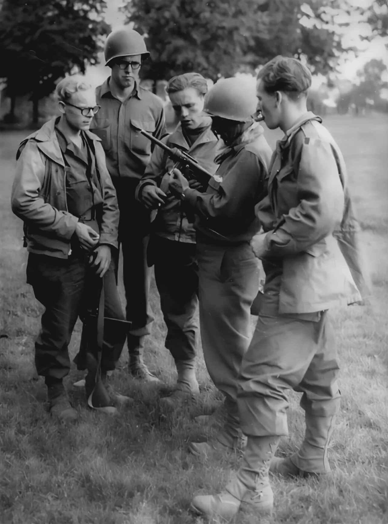 M3 Grease Gun demonstrated to Belgian troops by the U.S. soldier in October 1944